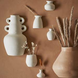 Wall-mounted paper mache vases
