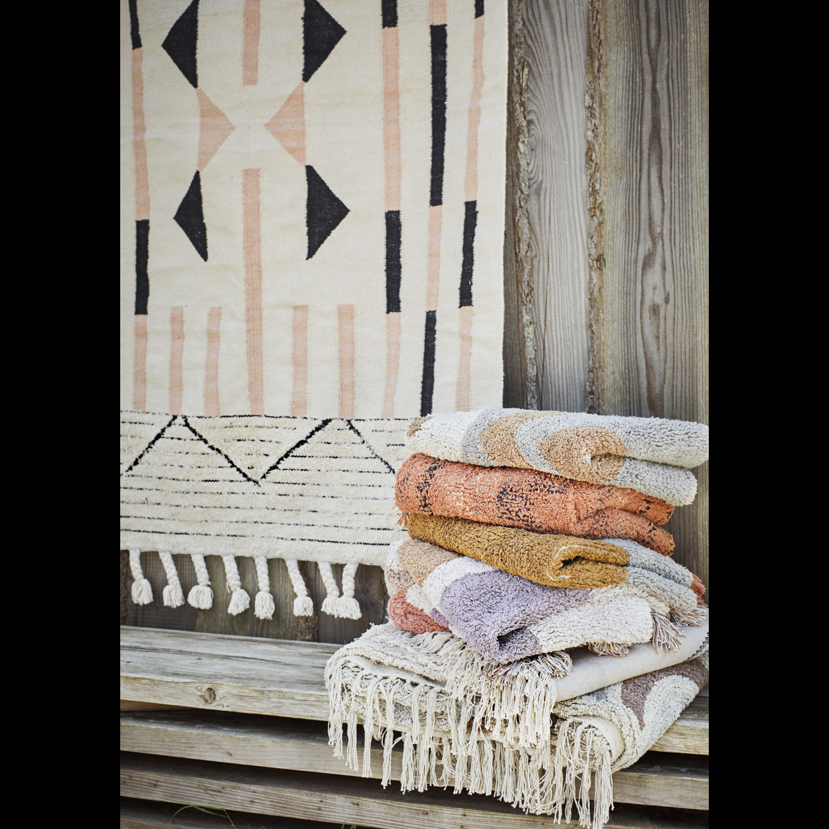 Handwoven frayed cotton rug