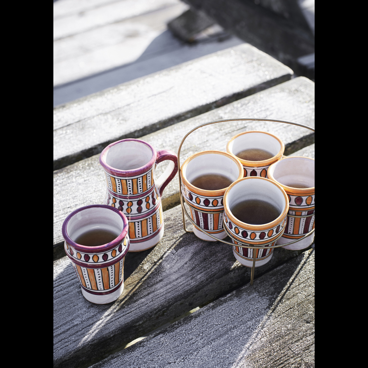 Iron drinking glass holder