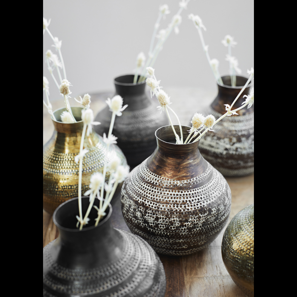 Hammered aluminum vase