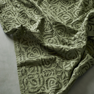 Handmade cutwork throw
