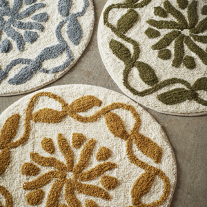 Round tufted bath mat